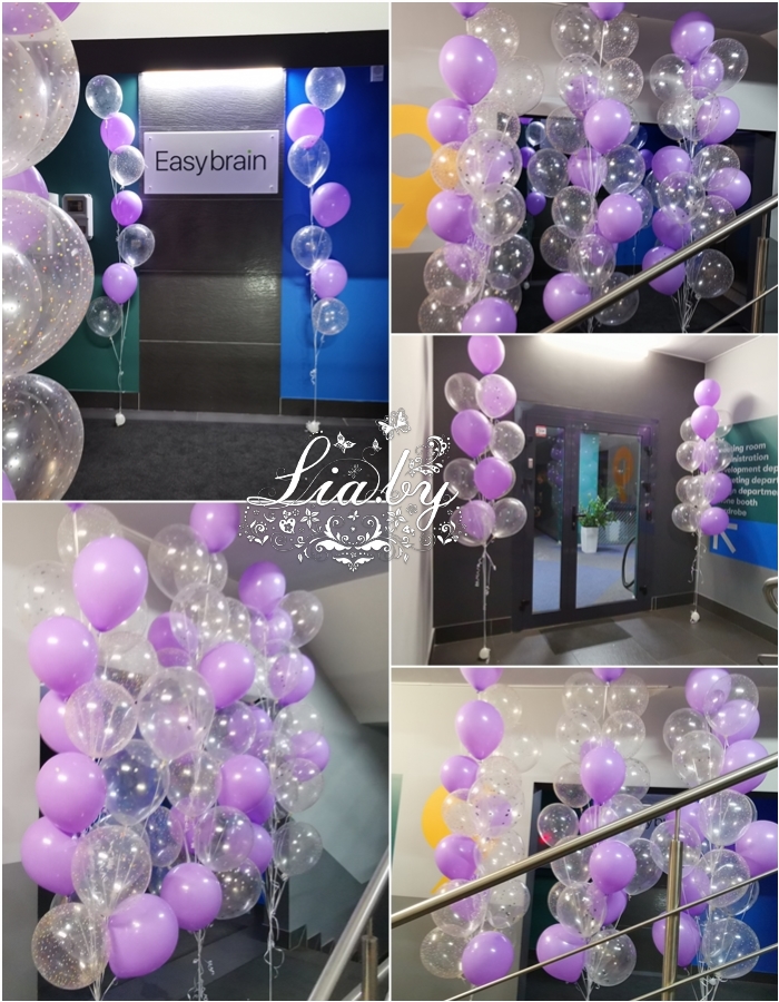 Украшение шарами офиса компании к 8 марта. шары с гелием