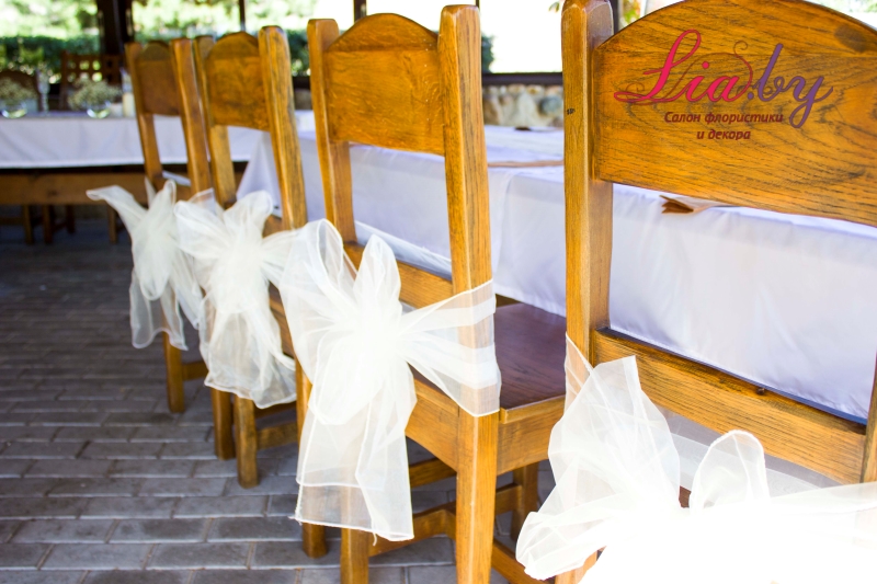 Украшение стульев бантами на свадьбу